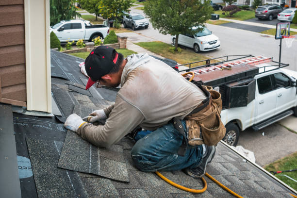 Professional Roofing technician working in Perry, NY